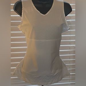 Undergarment  Tummylicious white shape wear. Size M